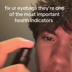 Applying HZA Revitalizing Eye Elixir